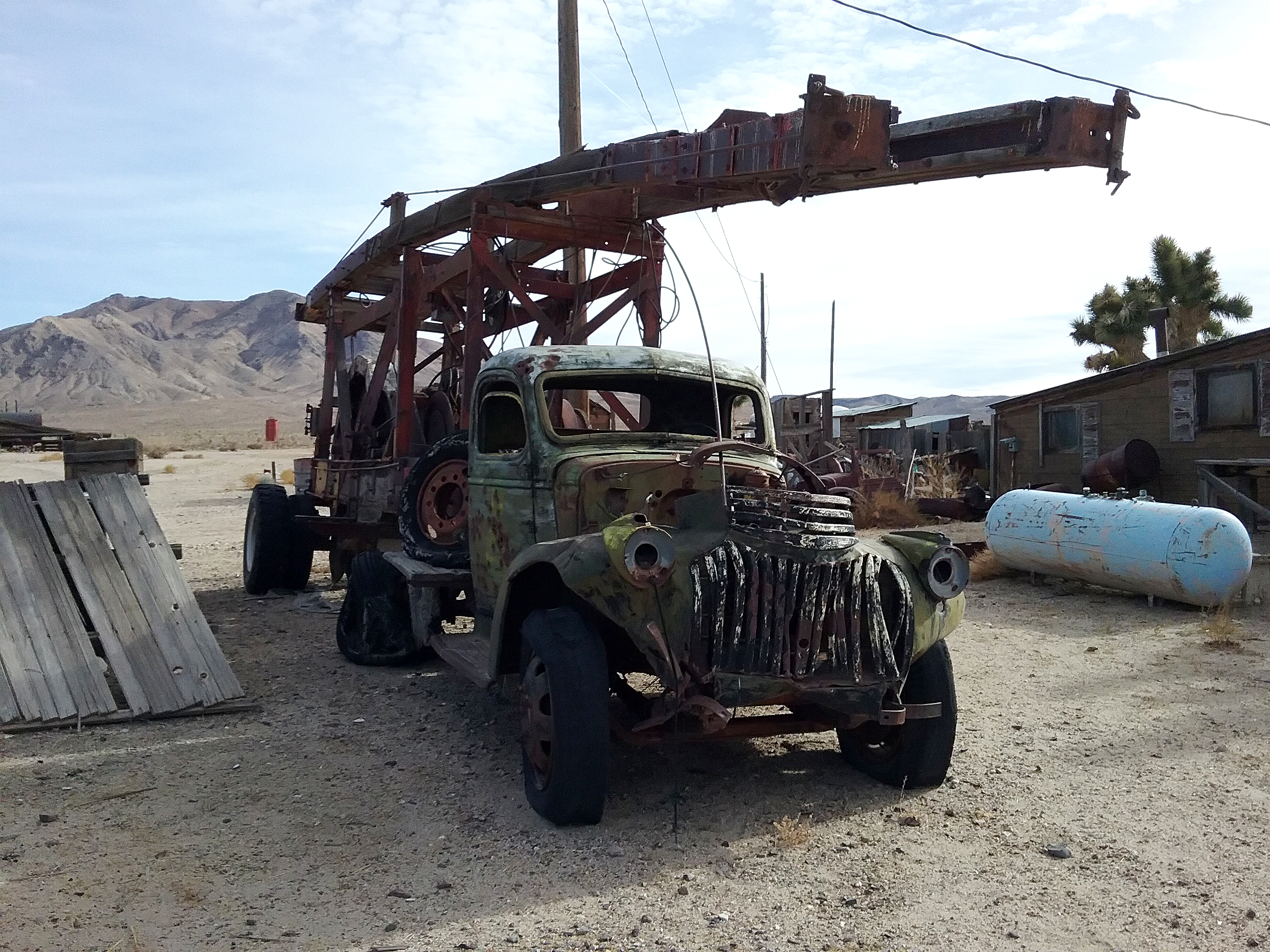 the ruined remains of an old mining truck in Gold Point, Nevada