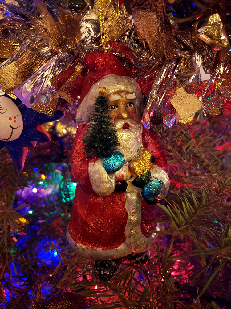 a Saint Nicholas ornament in a Christmas tree
