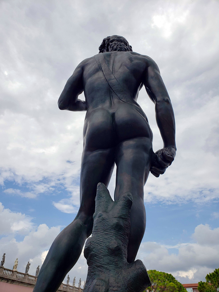 the backside of a recreation of the statue of David