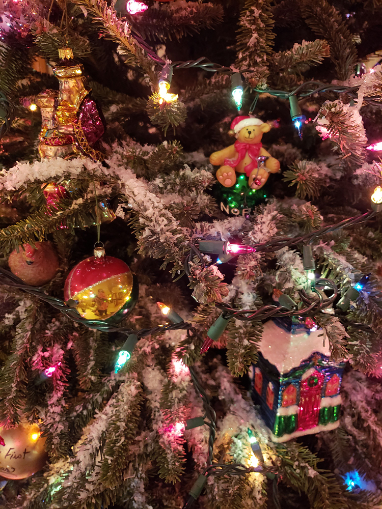 a close-up of a Christmas tree with ornaments