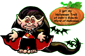 a troll doll dressed as a vampire